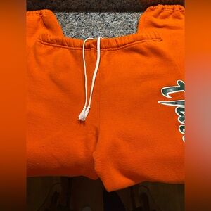 MIAMI HURRICANES sweatpants. Size M. Orange with Hurricanes logo